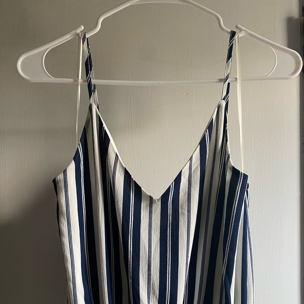 Blue and white one piece with slit on bottom